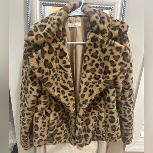 Elan (boutique) leopard print faux fur coat.